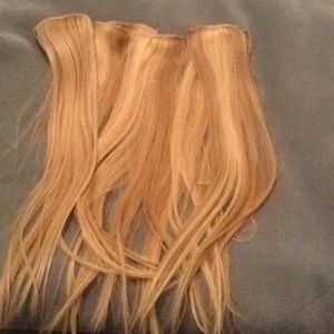 Blonde hair extensions